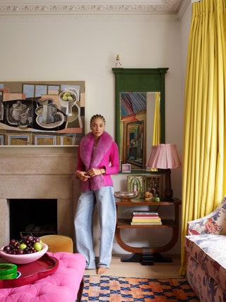 Adwoa Aboah standing in living room
