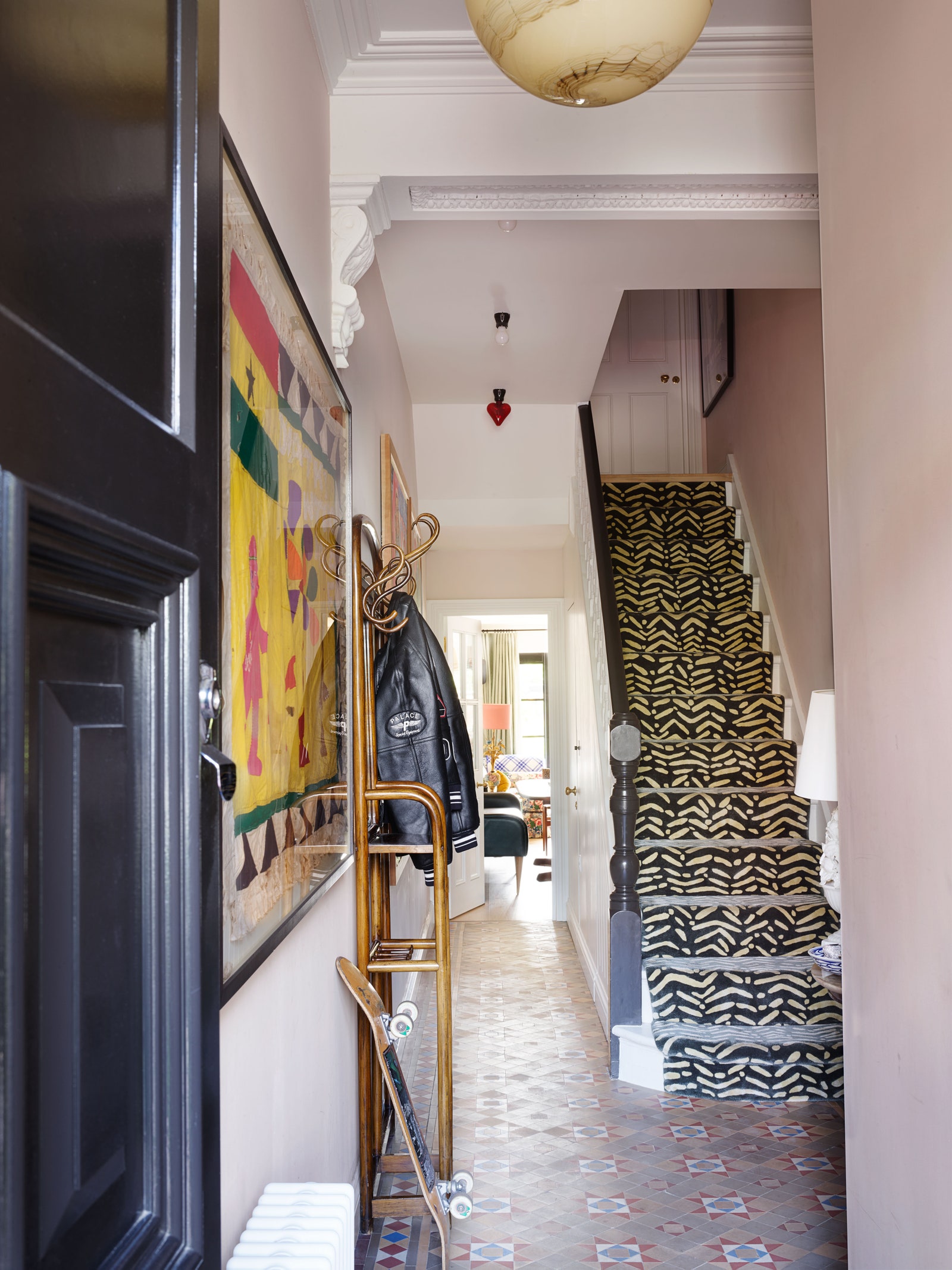 entryway with patterned stair runner