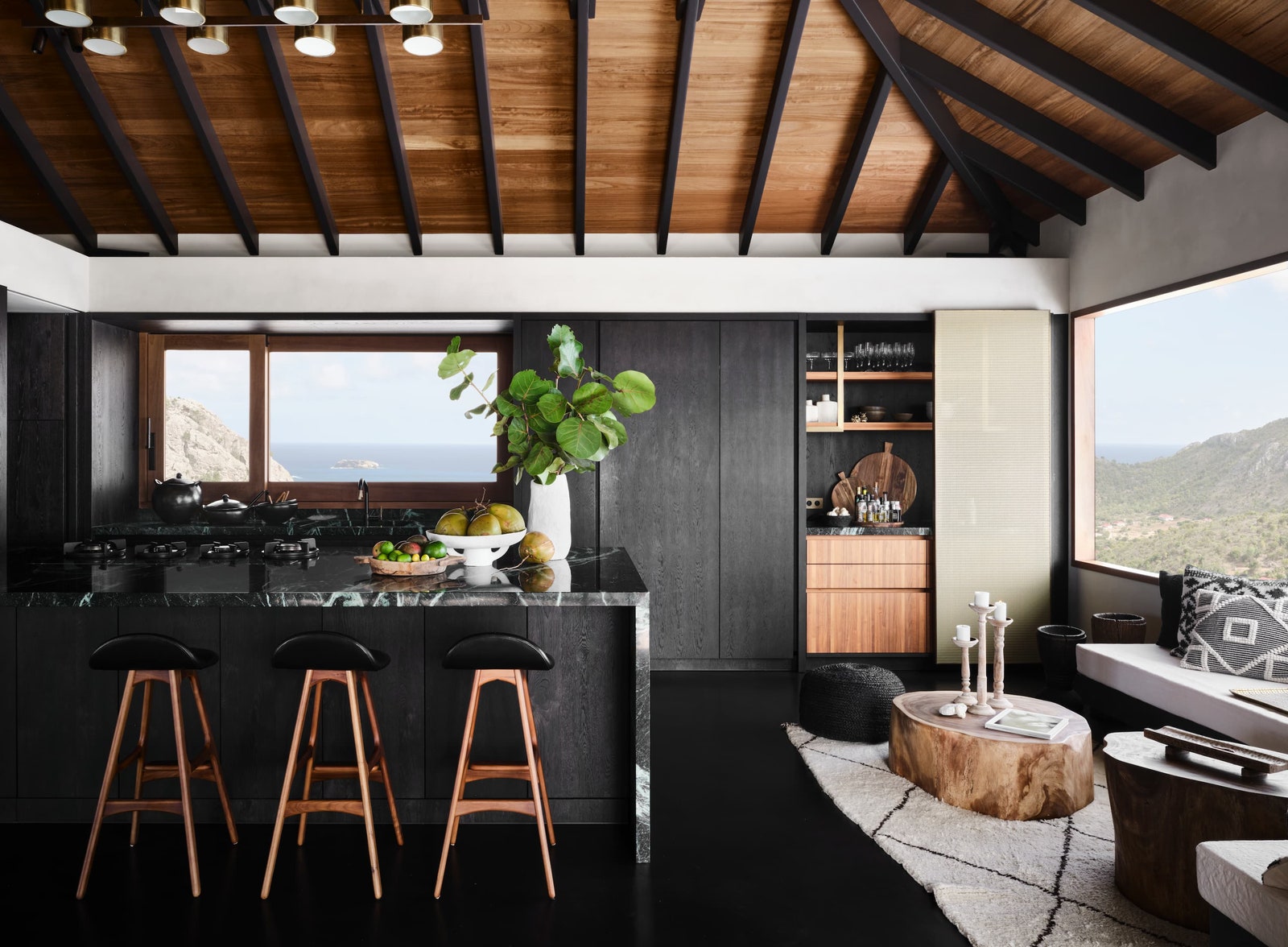 In the right hands a mostly black kitchen can work in any location—including in a tropical St. Barts hideaway. Alexander...