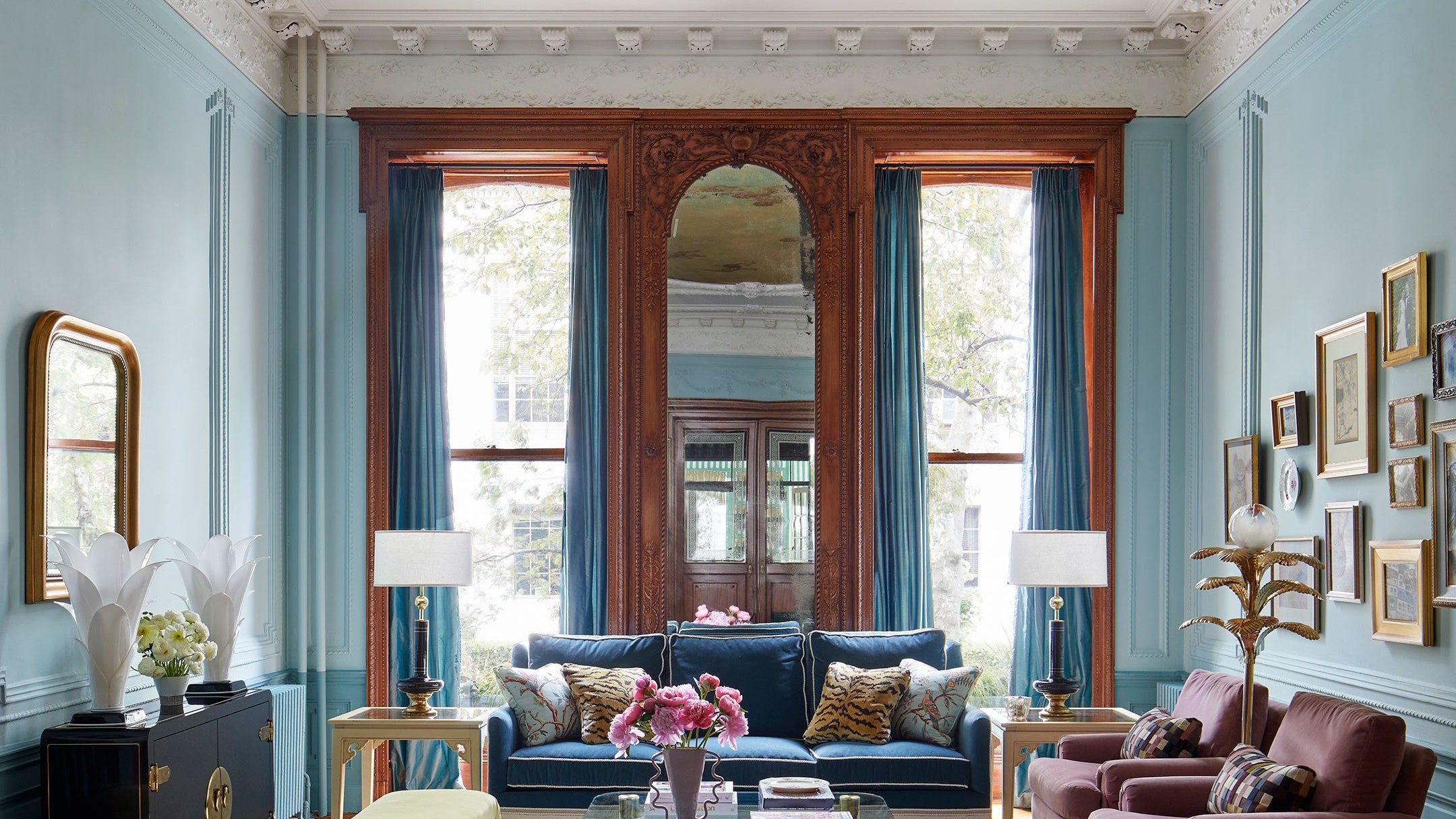 Brownstone parlor with intricate ceiling molding and antique frescoe