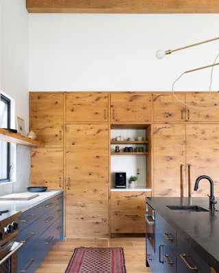 Builtin filtered water dispensers and stunning redwood made this coffee corner from Regan Baker a coffeebar dream. “Our...