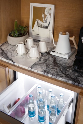 Theres no better storage for cold beverages than a pullout refrigerator drawer right under your coffee nook. In this...