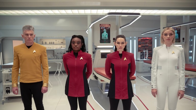 Anson Mount as Christopher Pike, Celia Rose Gooding as Uhura, Christina Chong as Lana, and Jess Bush as Nurse Chapel in Star Trek: Strange New Worlds